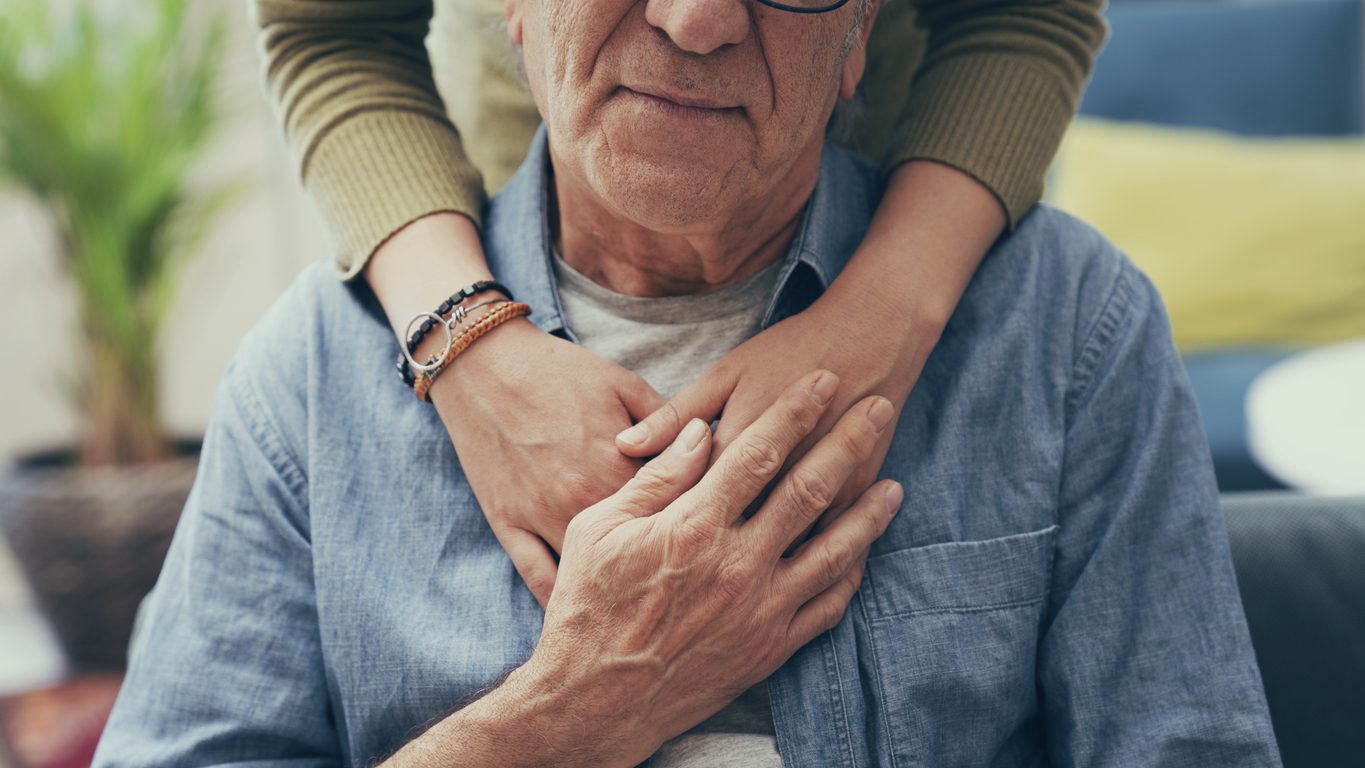Comforting hand on shoulder of man Photo on someone comforting a man