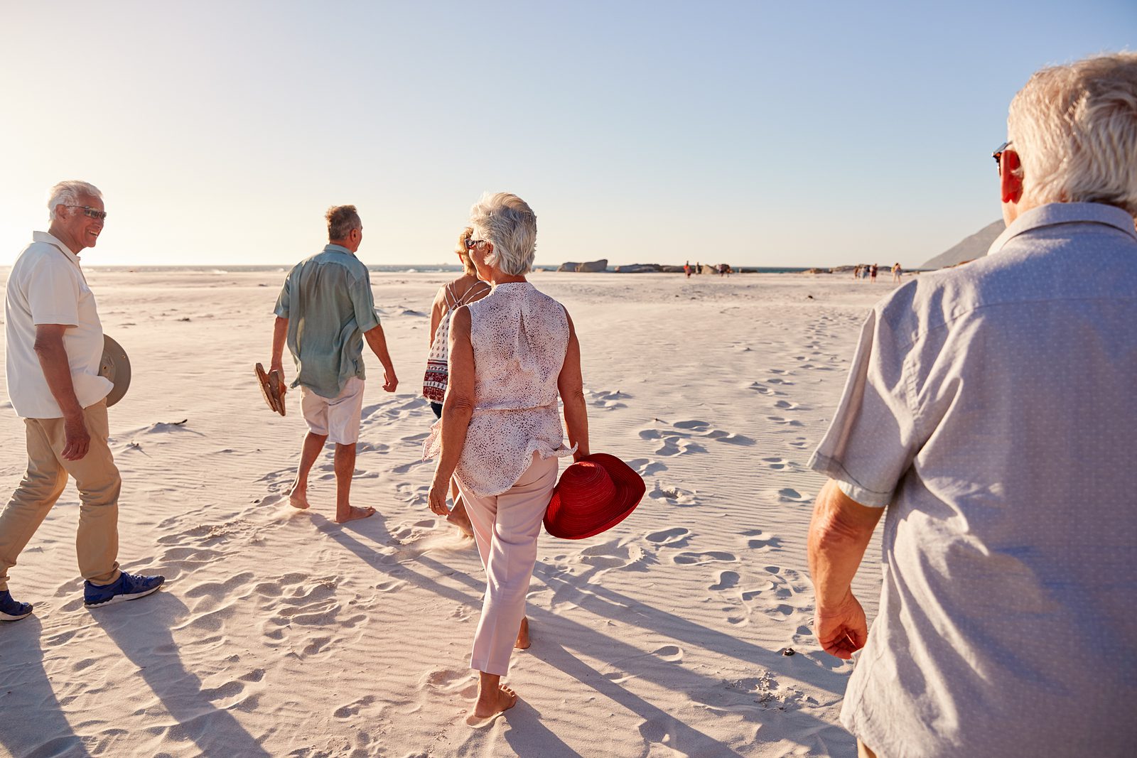 Seniors enjoying the beach together